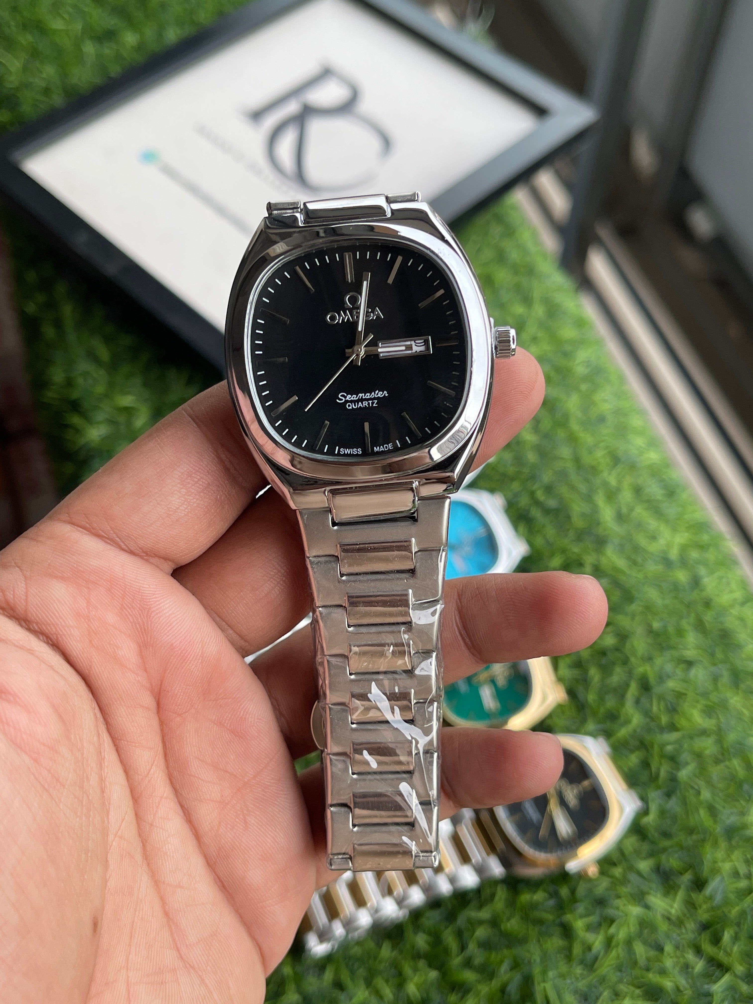 RC Omegaa Black Dial Quartz Watch with Silver Stainless Steel Chain